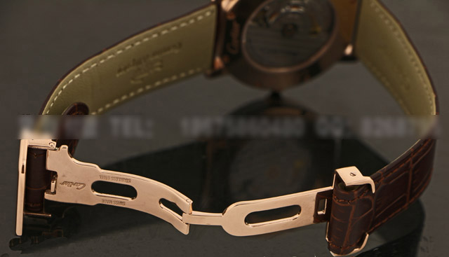 卡地亚路易系列镶钻双刻度镂空指针机械背透皮带男表